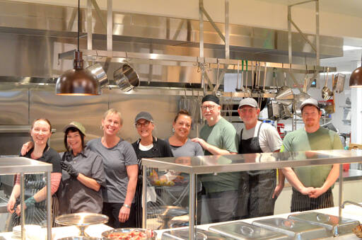 Garden Row Cafe staff in Jefferson Healthcares newly built kitchen, from the left: Aurora Kingslight, Shelly Perry, Aimee Smith, Michelle Poore, Teresa Schmidt, Jimmy Snyder, Arran Stark and Nick Collier. (Elijah Sussman/Peninsula Daily News)