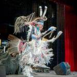 Steve Mullensky/for Peninsula Daily News
Supaman performs a "Men's War Dance" to a full house on Thursday at the Port Townsend High School auditorium. Supaman, whose real name is Christian Parrish Takes the Gun, is an Apsáalooke rapper and fancy war dancer who grew up in Crow Agency, Mont.