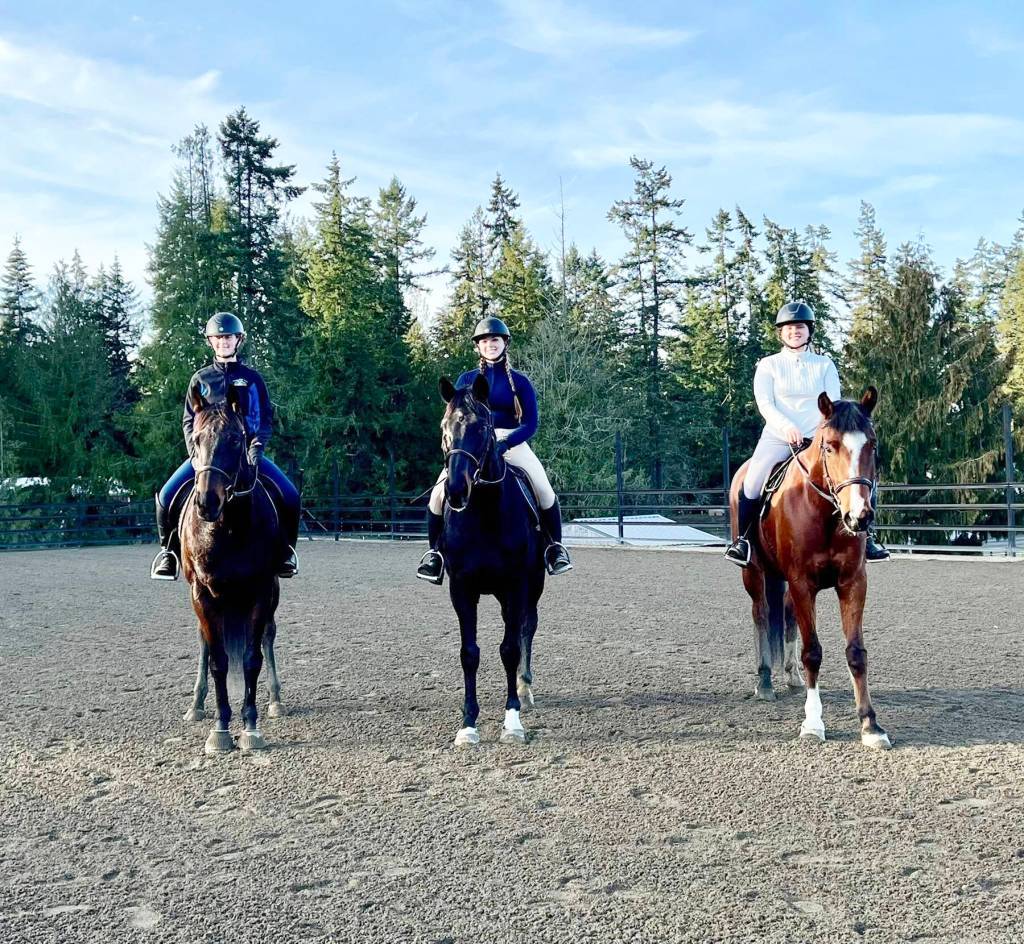 Instructor Nancy McCalab trailered some of her Living Well Farm students, Elise Sirguy and Mouse, left, Ella Garcelon on Finn and Phoebe Debord on Sunny for a field trip to Kari Paynes 4-L Arena off Blue Mountain Road. (Nancy McCaleb)