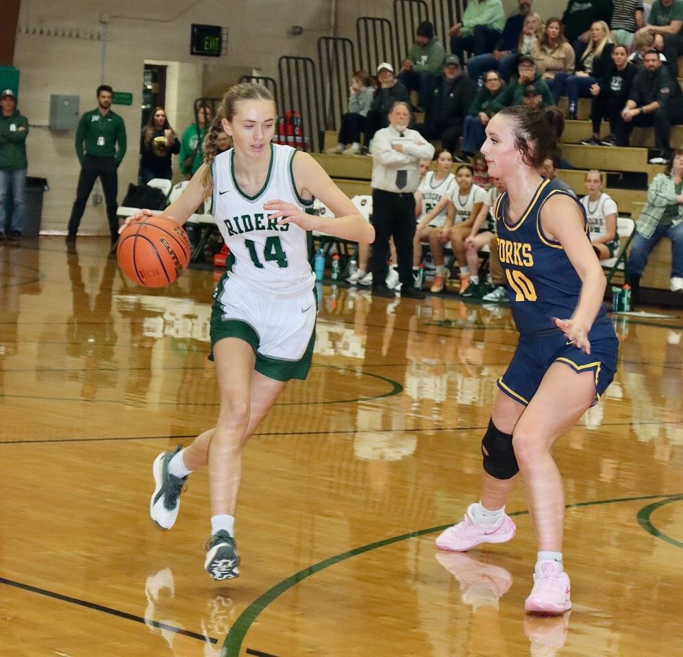 Dave Logan/for Peninsula Daily News 
Forks Avery Dilley defends against Port Angeles Storey Schmidt during the teams season opener last week.