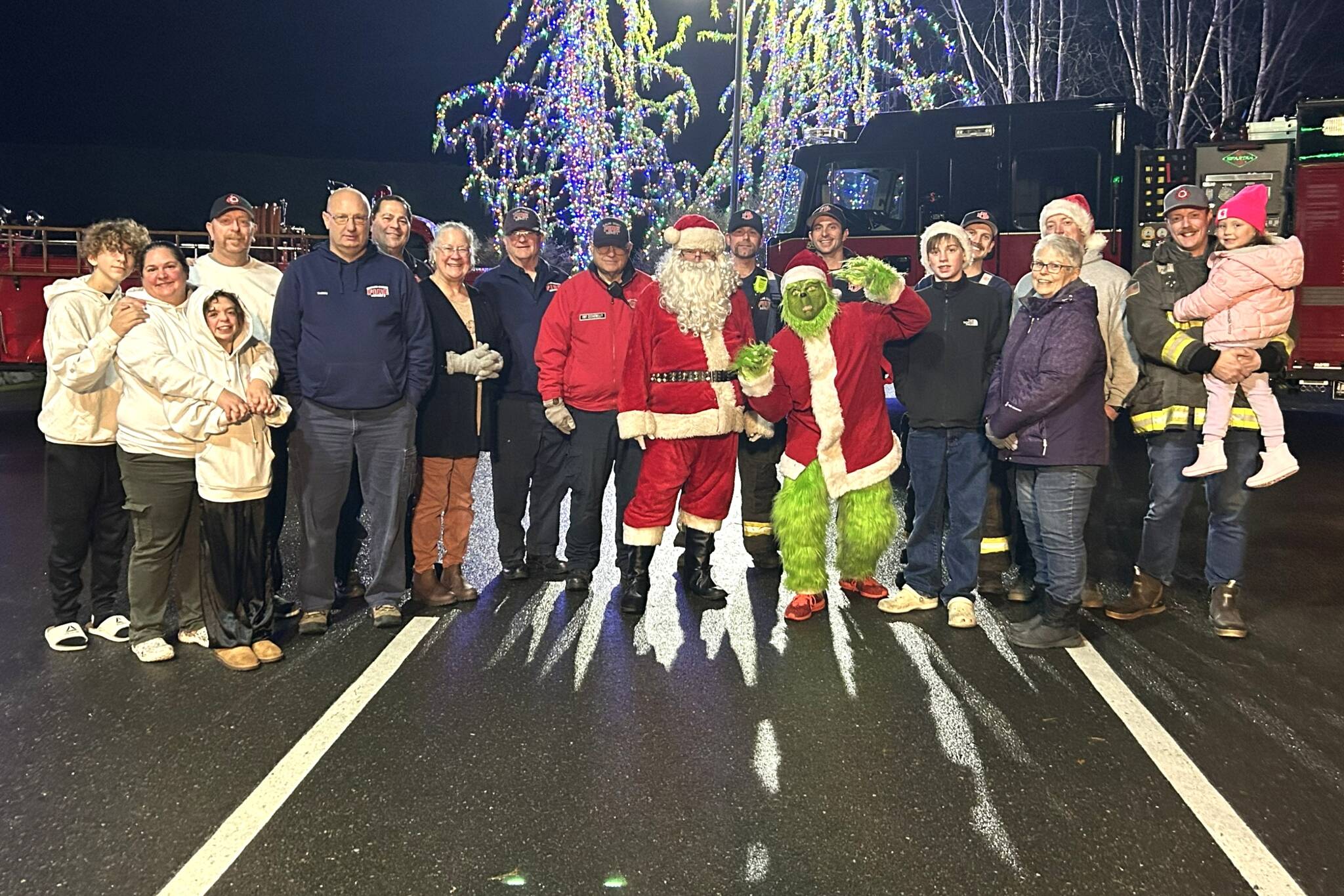 Santa Claus, the Grinch and career and volunteers with Clallam County Fire District 3, IAFF Local 2933 and the Community Emergency Response Team (CERT) will accept food and toy donations this week as part of Santas Toy and Food Fire Brigade in Sequim. The food and toy drive will end on Friday at Sequim Walmart with donations accepted from 9 a.m. to 9 p.m., and Santa arriving to hand out candy canes and take photos from 5 p.m. to 8 p.m. (Matthew Nash/Olympic Peninsula News Group)