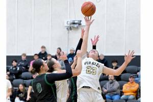 Peninsula Colleges Aspen Fraser battles for a rebound against Chemeketa on Friday night. Fraser has 12 points and 12 rebounds as the Pirates won 80-62. (Jay Cline/Peninsula College)