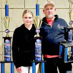 Kylin Weitz, 12, of Port Angeles, finished second in the 12 girls expert class and 12 girls cruiser class at the BMX USA Grant Nationals in Tulsa, Okla., last week, just seven weeks after fracturing her ankle at the world championships in Copenhagen. At right is Sean Coleman, Lincoln Park BMX operator, who finished seventh in the 51-55 novice class. (Britney Rowland)