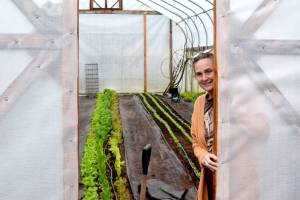 Port Townsend School Districts Food Service Director Shannon Gray in the Salish Coast production gardens hoop house. (Elijah Sussman/Peninsula Daily News)