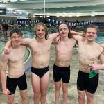 Port Angeles 400-yard free relay team achieved a state-qualifying time, improving their previous best by two seconds during the Riders swim meet against defending state-champion Bainbridge at Shore Aquatic Center on Wednesday in Port Angeles. Swimmers are, from left, Patrick Ross, Miles Van Denburg, Adam Kaminski and Thomas Jones.
