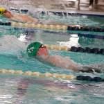 Linda Adams
Port Angeles Adam Kaminski competes in the 100-yard backstroke during a swim meet with defending state-champion Bainbridge at Shore Aquatic Center in Port Angeles.
