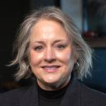 Andra Smith, Sequim Food Banks executive director, will take a job in February with the Washington Food Coalition, helping more than 300 hunger-relief agencies across the state with networking, finding new resources and understanding legislation. (Silas Crews)