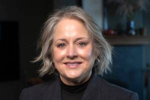 Andra Smith, Sequim Food Banks executive director, will take a job in February with the Washington Food Coalition, helping more than 300 hunger-relief agencies across the state with networking, finding new resources and understanding legislation. (Silas Crews)