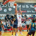 East Jeffersons Dillon Page-Castillo battle for a rebound against defending state champion Annie Wright in a game Tuesday in Port Townsend. Annie Wright won 89-44. (Steve Mullensky/for Peninsula Daily News)
