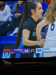 Neah Bays Allie Greene, left, a member of the Haskell Indian Nations University womens basketball team, guards a Kansas counterpart during the teams 785 Game Wednesday night at the famed Allen Fieldhouse at the University of Kansas. (ESPN)