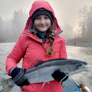 Washington State Guides Association 
Portlands Grace Melville caught this hatchery steelhead with a Hawkins jig while fishing on an unnamed Olympic Peninsula river.