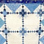 Snowflake, a handmade quilt by Nancy Foro, will be raffled to support Volunteer Hospice of Clallam County.