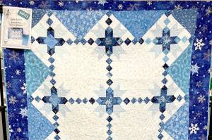Snowflake, a handmade quilt by Nancy Foro, will be raffled to support Volunteer Hospice of Clallam County.