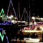 Holiday lights reflect off the water at Boat Haven in Port Angeles. (Dave Logan/for Peninsula Daily News)