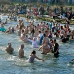 About 150 to 200 people jumped into 49-degree water at Hollywood Beach on Jan. 1, 2025, for the 37th annual Polar Bear Dip. The air temperature was about 39 degrees, so it was a short, brisk dip that they did three times. There was a beach fire to warm the dippers afterward as well as two portable saunas in the parking lot. The event was sponsored by Volunteer Hospice of Clallam County under the leadership of organizer Dan Welden. Hot drinks, tasty muffins and a certificate for participants were available. (Dave Logan/for Olympic Peninsula News Group)