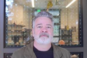 Michael Calvin Mills short story collection, The Caged Man, was released in December. (Elijah Sussman/Peninsula Daily News)