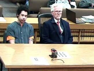 Aaron Fisher, left, appears in Clallam County Superior Court on Jan. 9 with his attorney Lane Wolfley at a hearing during which his trial was confirmed to begin on Jan. 26. He has been charged with second-degree murder. (Clallam County Superior Court)