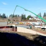 Construction is in the early stages at the new Hurricane Ridge Middle School in Port Angeles. A special cement delivery vehicle brings another batch for the schools foundation. (Dave Logan/for Peninsula Daily News)