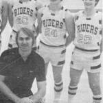 David Bingham, wearing Roughriders jersey number 20, poses for a photo on the basketball court in 1980.