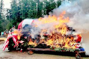 The Michael Trebert Chapter of the Daughters of the American Revolution, assisted by Trail Life USA and Heritage Girls, retired 1,900 U.S. flags and 1,360 veterans wreaths during a recent ceremony. The annual event also involved members of Carlsborg Veterans of Foreign Wars Post #6787, Sequim American Legion Post 62, Port Angeles Elks Lodge #353 Riders and more than 100 members of the public.