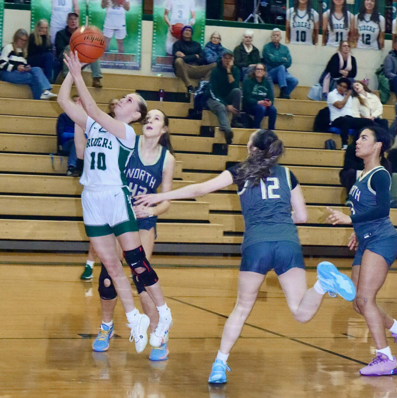 Port Angeles Teanna Clark (10) goes up for a layup against North Kitsap on Tuesday. The Riders came back from a double-digit deficit to win 43-36 to improve to 10-0 in the Olympic League. (Dave Logan/for Peninsula Daily News)