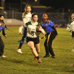 Port Angeles Miriam Cobb runs with the football during the Roughriders 35-14 win over Bremerton on Wednesday night at Sequim High School.