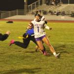 Matthew Nash (2)/Olympic Peninsula News Group
Sequims Ruby Moxley-Horgan cuts back and scores on a rushing touchdown during the Wolves 42-11 win over Bremerton on Wednesday night. The Wolves sealed a share of the first-ever Olympic League flag football championship with the victory.