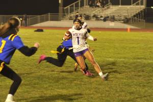 Matthew Nash (2)/Olympic Peninsula News Group
Sequims Ruby Moxley-Horgan cuts back and scores on a rushing touchdown during the Wolves 42-11 win over Bremerton on Wednesday night. The Wolves sealed a share of the first-ever Olympic League flag football championship with the victory.