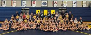 More than 80 members of the Forks and Port Angeles wrestling clubs competed in a special event held in honor of Jim Ross, a lifelong supporter of wrestling in Forks who recently died of cancer.