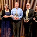 Port Angeles Community Award recipients gather after Saturday nights annual awards gala. From left, they are Frances Charles, Lower Elwha Klallam Tribe, Organization of the Year; Kyla Magner, Country Aire, Business of the Year; Amy Burghart and Doug Burghart, Mighty Pine Brewing, Emerging Business of the Year; Rick Ross, Educator of the Year; Kayla Fairchild, Young Leader of the Year; John Fox, Citizen of the Year. (Paula Hunt/Peninsula Daily News)