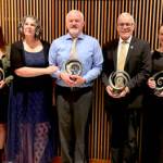 Port Angeles Community Award recipients gather after Saturday nights annual awards gala. From left, they are Frances Charles, Lower Elwha Klallam Tribe, Organization of the Year; Kyla Magner, Country Aire, Business of the Year; Amy Burghart and Doug Burghart, Mighty Pine Brewing, Emerging Business of the Year; Rick Ross, Educator of the Year; Kayla Fairchild, Young Leader of the Year; John Fox, Citizen of the Year. (Paula Hunt/Peninsula Daily News)