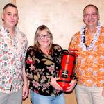 EMT Teresa DeRousie, center, was recognized for her long service to Clallam County Fire District 2. Presenting the award were Deputy Fire Chief Kevin Denton, left, and Chief Jake Patterson. (Clallam County Fire District 2)