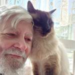 Poet John Delaney with Ramen the cat. Delaneys collection Catechisms is based on their relationship. (John Delaney)