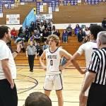 Olympic Peninsula News Group photo by Pierre LaBossiere/
Sequim boys basketball coach Craig Brooks talks to Zeke Schmadeke (0) and Solomon Sheppard during the game Saturday, Feb. 14 in Sequim. The Wolves went on to defeat North Mason 69-42 in the district game.
