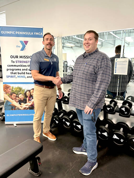 Joey Belanger, the YMCAs vice president for operations, left, and Ryan Amiot, the executive director of Shore Aquatic Center, celebrate the joint membership pilot option now available between the two organizations.