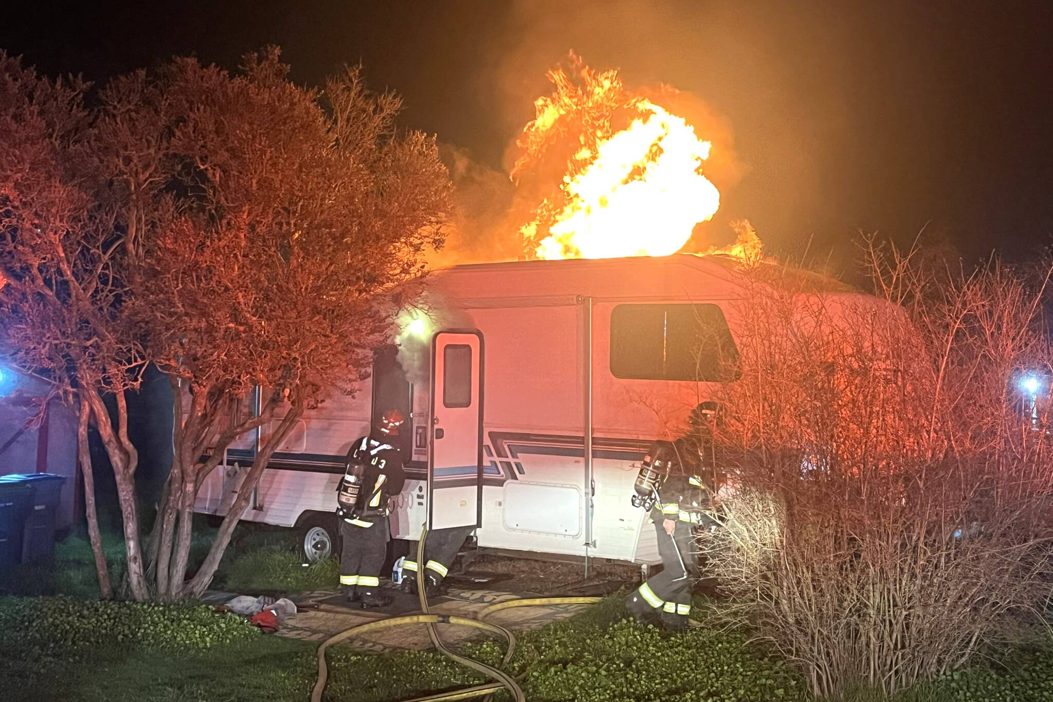 Photo courtesy Chris Turner, CCFD3/ A RV caught fire early Sunday, Feb. 15 on West Alder Street. The homeowner was uninjured, and the cause is under investigation, Clallam County Fire District 3 reports.