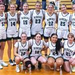 The Port Angeles girls basketball team celebrates its final game of the year on its home floor, beating Orting 63-11 in the District 3 2A tournament quarterfinals. The Riders will now be playing all of their postseason games on the road and play for a chance to qualify for the state tournament Friday night in Bainbridge. (Pierre LaBossiere/Peninsula Daily News)