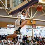 Sequims Solomon Sheppard dunks the ball against Port Angeles in Sequim on Thursday night. (Diamond Gentile/for Peninsula Daily News)