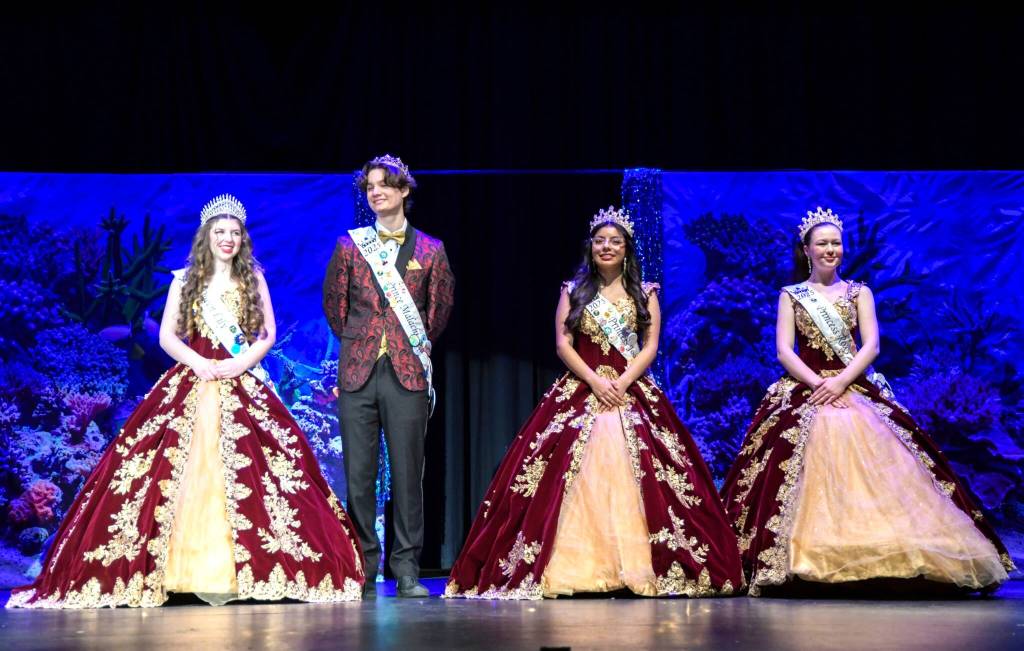 Last years Irrigation Festival royalty, from left, queen Lily Tjemsland, prince Malachi Byrne, princess Joanna Morales and princess Roxy Woods gather after the share their thank yous and farewell speeches via voiceover at the Royalty Ambassador Scholarship Pageant. Earlier they sang a remix of Wannabe by The Spice Girls dedicated to this years royalty. (Monica Berkseth/Olympic Peninsula News Group)