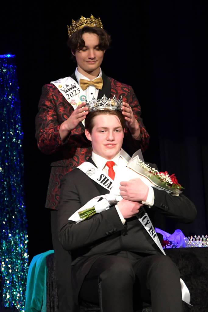 Malachi Byrne, last years Sequim Irrigation Festival prince, crowns 2026 prince Brayden Baritelle. (Monica Berkseth/Olympic Peninsula News Group)