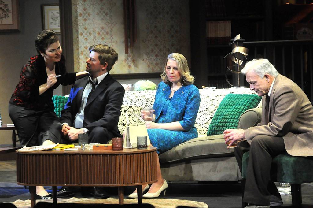 Martha, played by Joodie Klinke, tries to seduce Nick (Colby Thomas) as his wife Honey (Courtney Thomas) becomes uncomfortable and Marthas husband George (Vince Campbell) reacts with indifference in OTAs staging of Whos Afraid of Virginia Woolf? (Matthew Nash/Olympic Peninsula News Group)