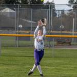 Sequim outfielder Seren McClurken makes a catch during Fridays game against Bremerton. The Wolves rallied from a 3-0 deficit to win. (Emily Mathiessen/for Peninsula Daily News)