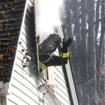 Community Paramedic Mark Karjalainen waves from a window as he awaits a training session to begin on March 21. (Matthew Nash/Olympic Peninsula News Group)