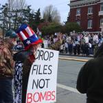 Jay Bukovnik of Port Angeles was dressed patriotically for the No Kings rally on Saturday as she and the hundreds gathered waved to passing cars near the Clallam County Courthouse. (Dave Logan/for Peninsula Daily News)