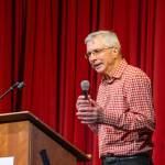 Retired teacher, mentor and coach, Jim Guthrie speaks at the Port Townsend High School auditorium on Saturday to receive the second annual Alumni Inductee Award and to be inducted into the PTHS Alumni Hall of Fame. Guthrie was a teacher, mentor and coach at PTHS for 27 years and was the only one of the five inductees to be present for the event. (Steve Mullensky/for Peninsula Daily News)