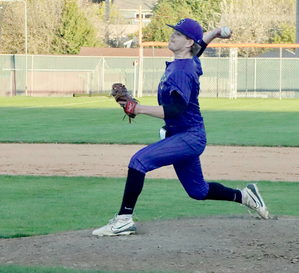 Dave Logan/for Peninsula Daily News Sequims Zeke Schmadeke earned the win on the mound after throwing a complete-game four-hitter in a 2-1 win over rival Port Angeles on Tuesday night at Civic Field.