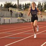 Sequim freshman Emily Bair finishes the anchor leg for the Wolves 4x400 relay squad that also features Birdie Pyeatt, Kalea Keate and Kylie Peters during a three-team at Sequim High School.