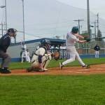 Port Angeles Abe Brenkman hits a single down the left-field line against North Kitsap. Brenkman later came around to score. (Pierre LaBossiere/Peninsula Daily News)