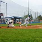 Port Angeles Parker Pavlak successfully lays down a sacrifice bunt against North Kitsap at Civic Field in Port Angeles on Friday. Pavlak drove in the winning run with a sacrifice fly in the bottom of the eighth inning for a 6-5 victory over the Vikings. (Pierre LaBossiere/Peninsula Daily News)