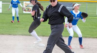 Sequims Rylie Doig (2), is safe at second base for the Wolves softball team Friday against Olympic. The Wolves lost a wild game 17-7. (Emily Matthiessen/for Peninsula Daily News)